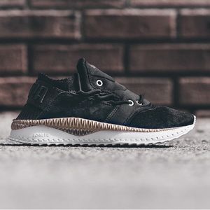 Puma Tsugi Shinsei metallic black and rose gold sneakers, size 5.5